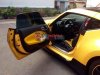 Nissan 370Z 2009 - Cần bán Nissan 370Z năm 2009, màu vàng, xe nhập, số tự động