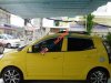 Kia Morning SX AT 2011 - Salon Auto Tuấn Thanh Tùng cần bán gấp Kia Morning SX AT 2011, màu vàng, 330tr