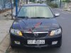 Mazda 323 Classic 1.6MT 2002 - Bán xe Mazda 323 Classic 1.6MT đời 2002, màu đen xe gia đình