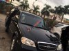 Kia Carnival GS  2006 - Cần bán xe Kia Carnival GS 2006, màu đen