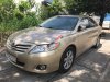 Toyota Camry LE 2010 - Bán Toyota Camry LE đời 2010, màu vàng, nhập khẩu nguyên chiếc