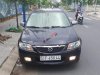 Mazda 323 Classic 2002 - Cần bán xe Mazda 323 Classic đời 2002, màu đen xe gia đình, giá 200tr