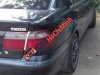 Mazda 626    1999 - Bán ô tô Mazda 626 năm 1999, màu đen số sàn, 178tr