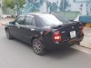 Mazda 323 Classic 2002 - Cần bán xe Mazda 323 Classic đời 2002, màu đen xe gia đình, giá 200tr