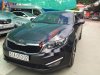 Kia Optima  AT 2011 - Cần bán xe Kia Optima AT 2011, màu đen, lăn bánh 2011