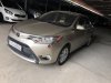 Toyota Vios E 2014 - Bán Toyota Vios E đời 2014, giá 506 triệu, còn thương lượng giá, màu nâu vàng