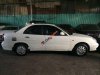 Daewoo Nubira  II  2004 - Cần bán gấp Daewoo Nubira II 2004, màu trắng xe gia đình