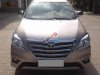 Toyota Innova G 2014 - Cần bán xe Toyota Innova G 2014, màu vàng số sàn