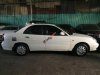 Daewoo Nubira 2004 - Cần bán gấp Daewoo Nubira năm sản xuất 2004, màu trắng
