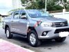 Toyota Hilux MT 2016 - Cần bán lại xe Toyota Hilux MT sản xuất năm 2016, màu bạc còn mới, giá tốt