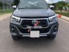Toyota Hilux 2019 - Cần bán Toyota Hilux đời 2019 còn mới, màu đen