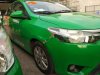 Toyota Vios 2015 - Cần bán xe Toyota Vios E MT sản xuất 2015, màu xanh lục số sàn, 290 triệu