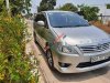 Toyota Innova 2013 - Cần bán xe Toyota Innova E đời 2013, màu bạc còn mới
