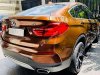 BMW X4   2.0 Xline 2016 - Bán BMW X4 2.0 Xline đời 2016, màu vàng cam, nhập khẩu nguyên chiếc