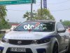 Kia Cerato Koup    2.0AT 2010 - Bán Kia Cerato Koup 2.0AT năm 2010, màu trắng, nhập khẩu nguyên chiếc, giá 350tr