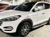 Hyundai Tucson 2016 - Bán xe Hyundai Tucson 2.0 2016 xăng đặc biệt trắng