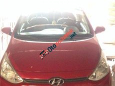Hyundai i10    MT 2014 - Chính chủ bán ô tô Hyundai i10 MT đời 2014, màu đỏ