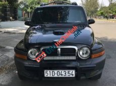 Ssangyong Korando   2004 - Cần bán xe cũ Ssangyong Korando đời 2004, màu đen