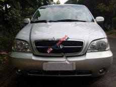 Kia Carnival GS 2006 - Cần bán gấp Kia Carnival GS đời 2006, màu bạc số sàn