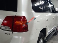 Toyota Land Cruiser 5.7L 2015 - Bán Toyota Land Cuirser 5.7 L đời 2015 màu trắng, số tự động, đồng sơn máy zin, xe chạy 6000 milse, xe gia đình, ít dùng