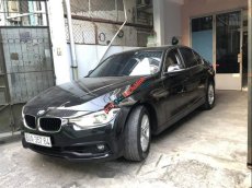 BMW 3 Series  320 LCI 2017 - Cần bán xe BMW 3 Series 320 LCI đời 2017, màu đen còn mới