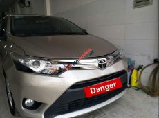 Toyota Vios G 2015 - Bán Toyota Vios G 2015, màu vàng xe gia đình