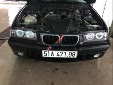 BMW 3 Series  320i 1997 - Bán ô tô BMW 3 Series 320i đời 1997, màu đen, xe nhập, 140 triệu