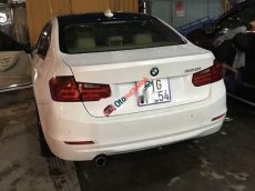 BMW 3 Series 2013 - Bán BMW 320i 2013, màu trắng, xe nhập chính chủ