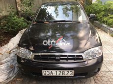 Kia Spectra 2003 - Màu đen, xe nhập