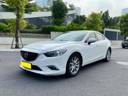 Mazda 6 2.0 2016 - Bán xe Mazda 6 2016  màu trắng 2.0 số tự động xe gia đình sử dụng ít đi 