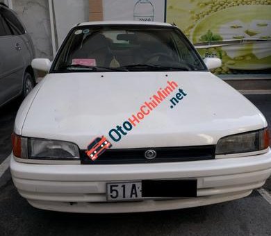 Mazda 323 1998 - Cần bán gấp Mazda 323 đời 1998, màu trắng, 90 triệu