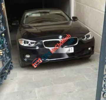 BMW 3 Series 320i  2014 - Cần bán lại xe BMW 3 Series 320i 2014, màu đen, xe nhập xe gia đình